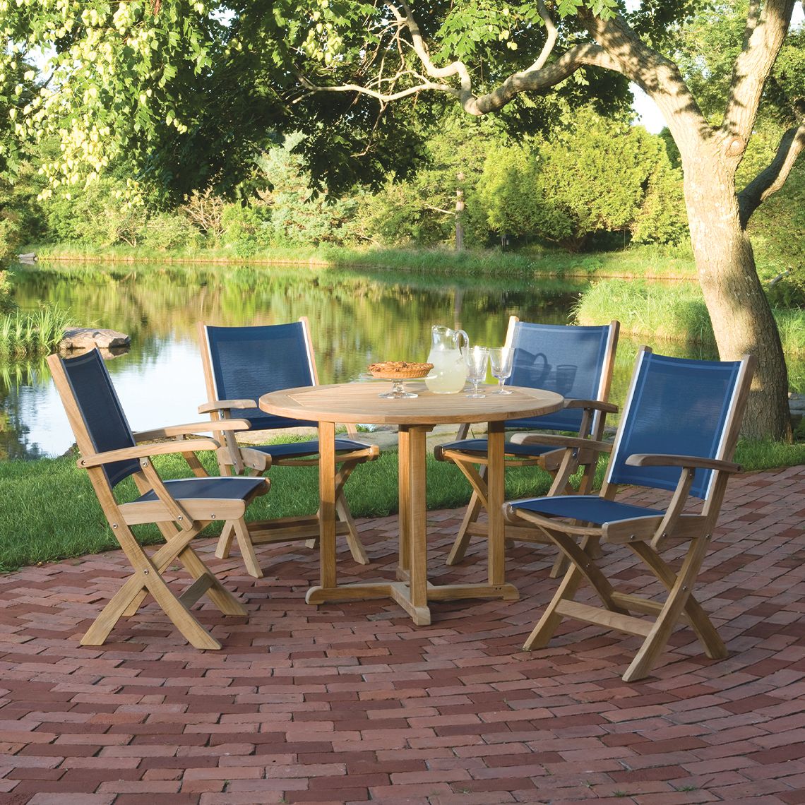 St. Tropez Round Teak Dining Set with Folding Arm Chairs