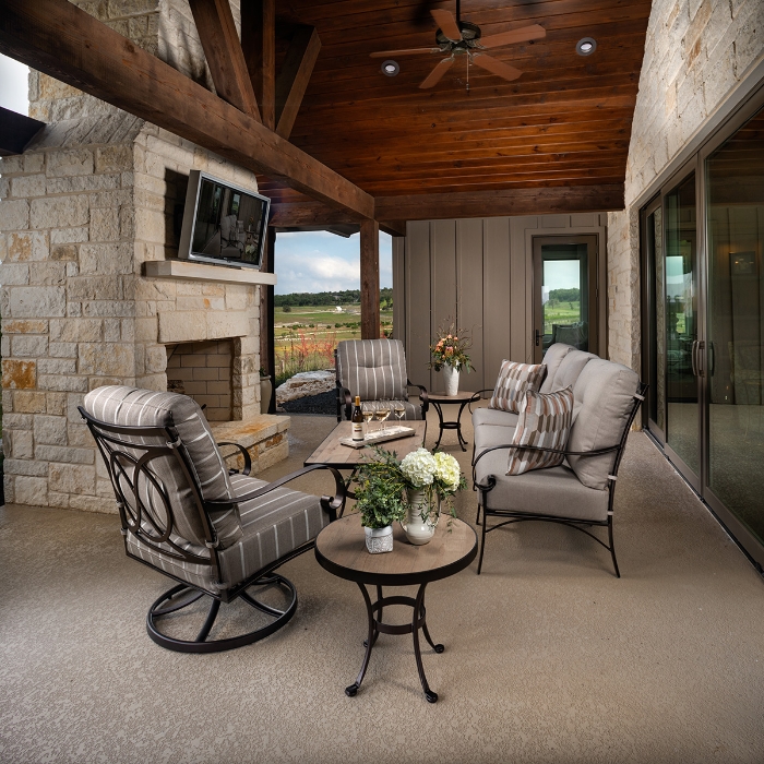 Pasadera Sofa and Swivel Rocker Patio Set